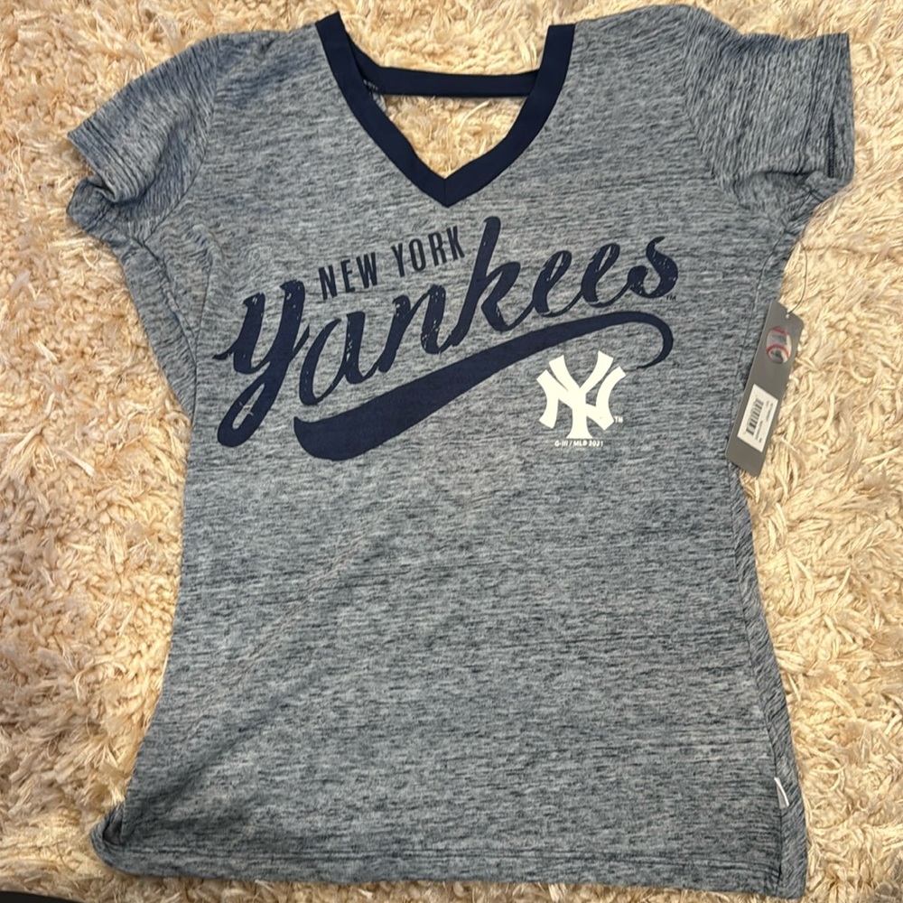 New with Tags Womans New York Yankee top with fashionable crisscross back